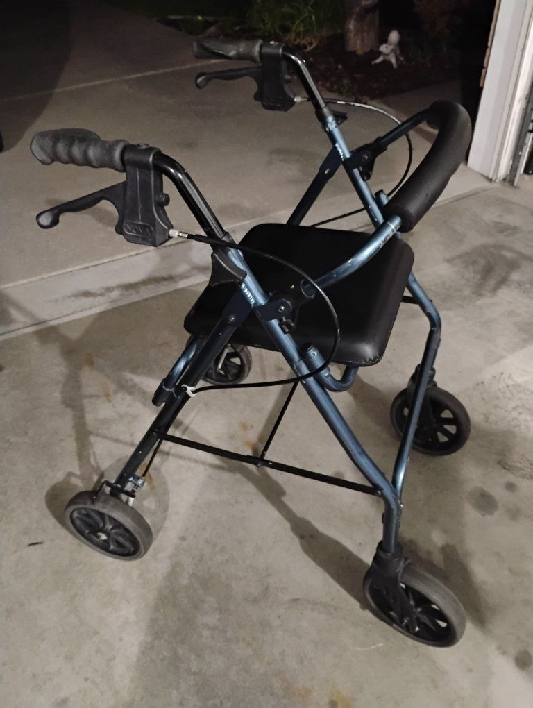 Nova Blue Folding Four-Wheel Rollator Walker with Seat