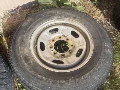 Ford 245/75R17 Tire on Steel Wheel - Good Tread