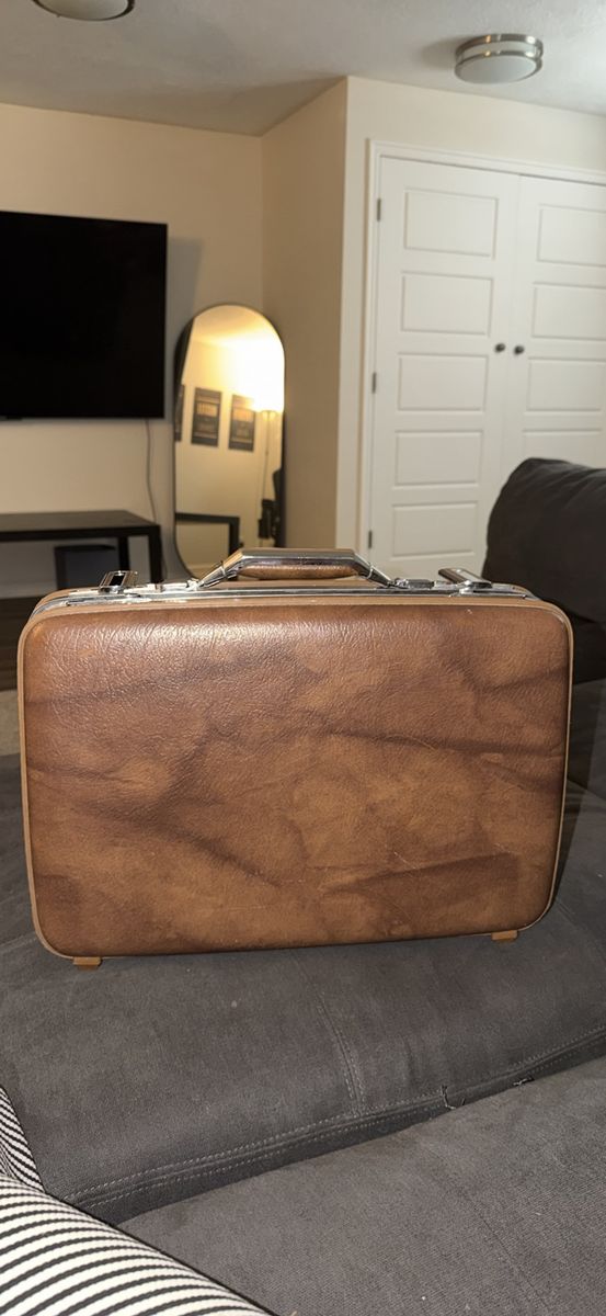 Vintage leather American Traveler suitcase