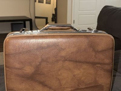 Vintage leather American Traveler suitcase