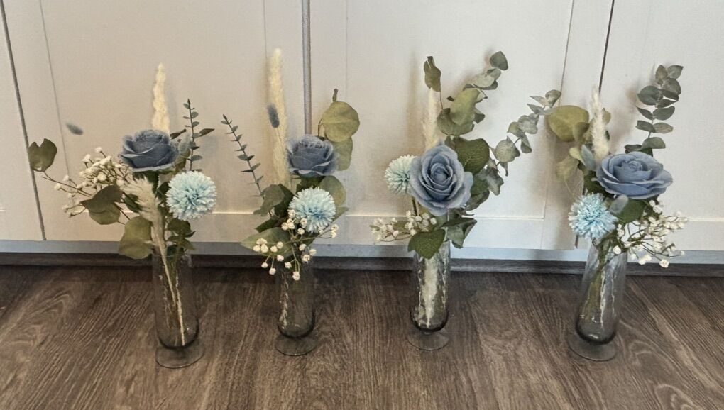 4 Blue Flower Arrangements In A  Vase