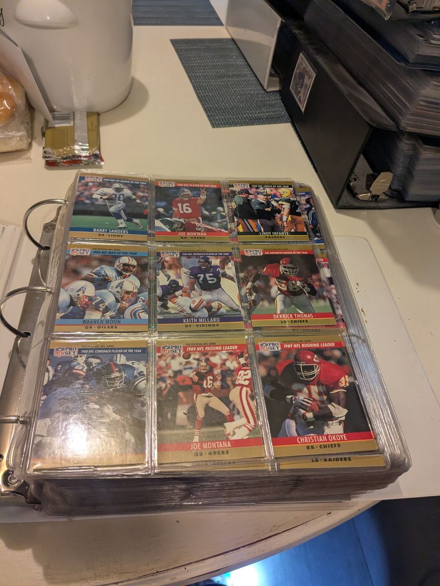 Big binder of 1990 proset football cards 