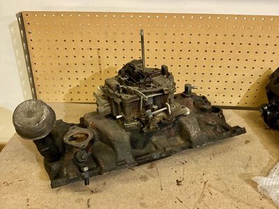 Chevy manifold and carburetor 1960s