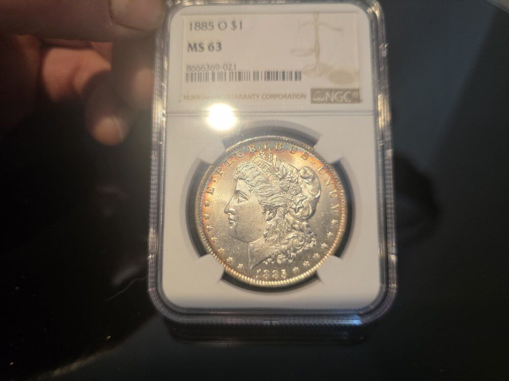 1885 Morgan silver dollar toner