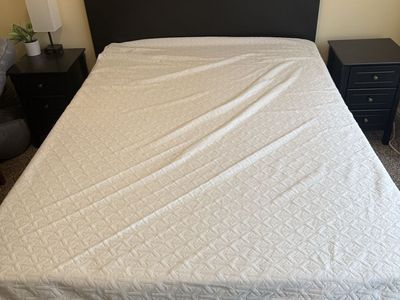 Full Size Purple mattress with bed frame