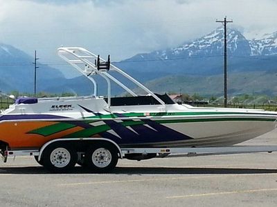 Sleek Craft Power Boat with Wakeboard Tower and Tandem Axle Trailer