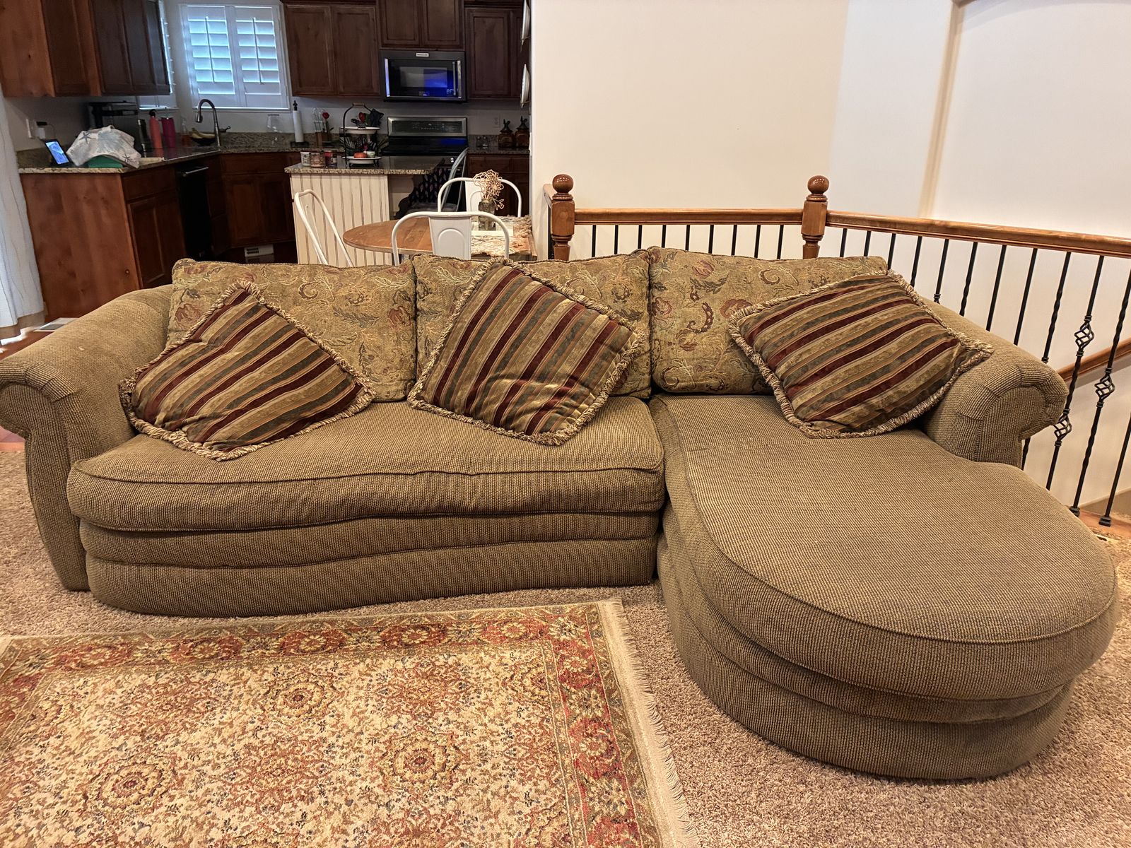 Well-cared-for couch that has seen limited use and remains in good condition.