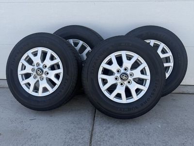 Basically brand new Firestone HLT Tires with Tacoma OEM Wheels - Set of 4, P245/70 17