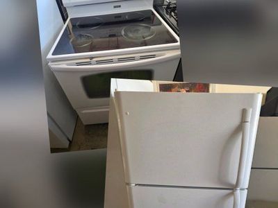frigidaire refrigerator and Amana electric stove