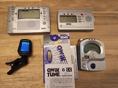 Guitar/bass/instrument tuner and metronome