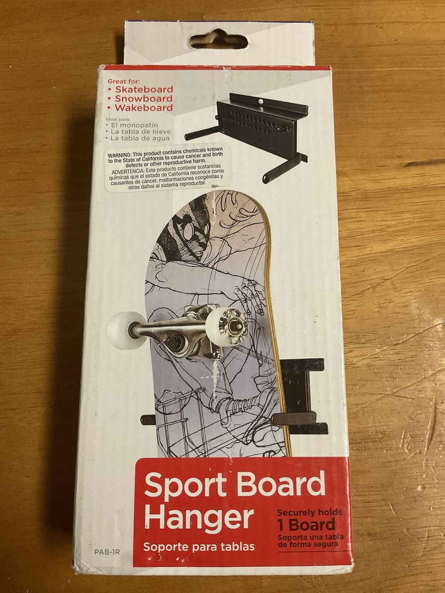 Skateboard, snowboard storage hanger