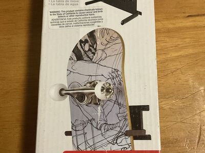 Skateboard, snowboard storage hanger