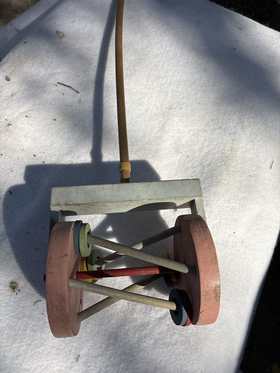 Vintage Wooden Push Lawn Mower Toy with Colorful Spinning Cylinders
