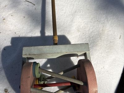 Vintage Wooden Push Lawn Mower Toy with Colorful Spinning Cylinders
