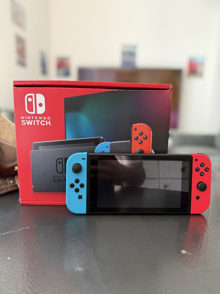 Nintendo Switch Console with Neon Blue and Red Joy-Con Controllers