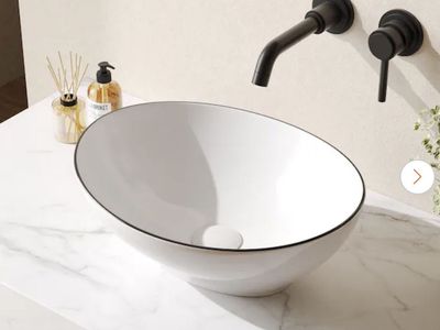 New. Deer Valley Modern Oval Ceramic Vessel Sink White with Black Trim