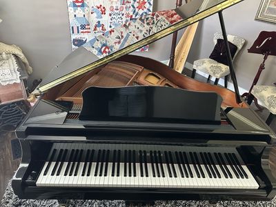 Yamaha Black Polished Grand Piano with Bench