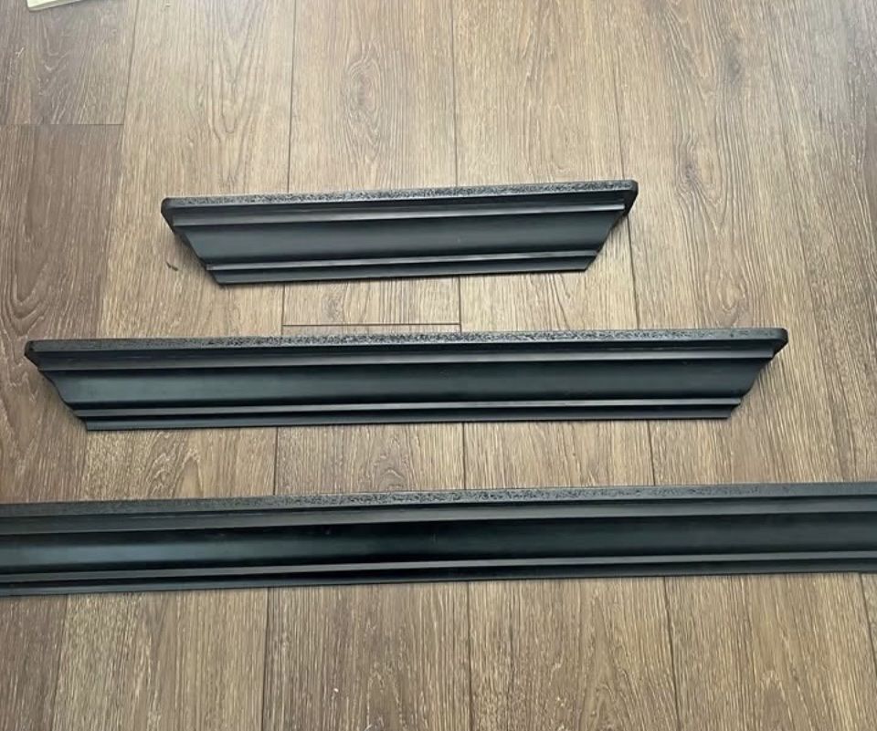3 black floating shelves
