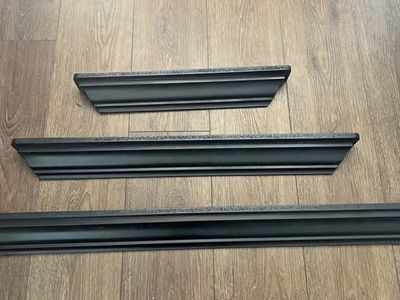 3 black floating shelves