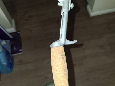 Vintage Fiberglass Baitcasting Fishing Rod with Offset Pistol Grip Cork Handle