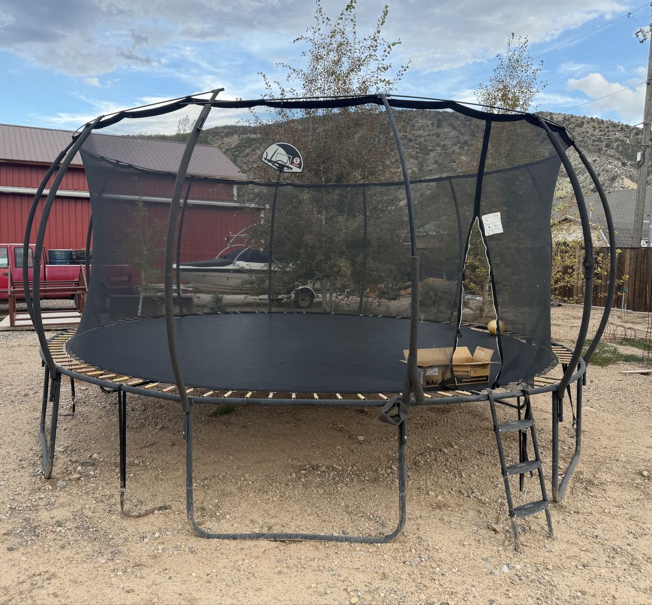 16’ one year old trampoline in great shape