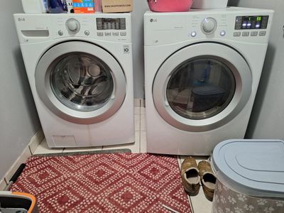 LG Inverter Direct Drive front-load washing and dryer electrical machine.