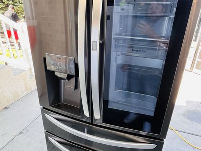 $850 OBO GOOD LG FRIDGE GLASS DOOR IN DOOR COUNTER DEPTH