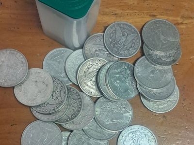 Pile of Morgan Silver Dollars
