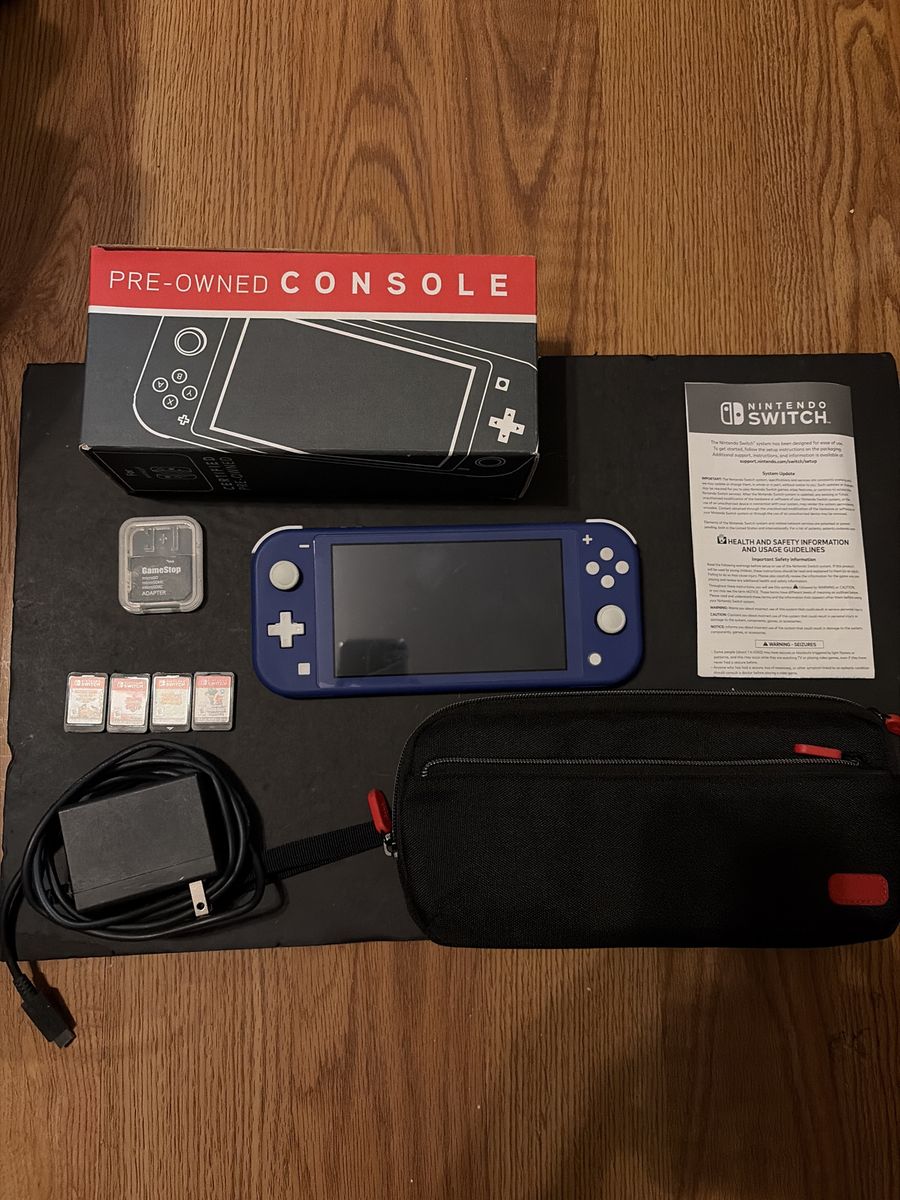 Nintendo Switch lite + 4 games OBO