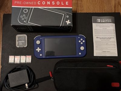 Nintendo Switch lite + 4 games OBO
