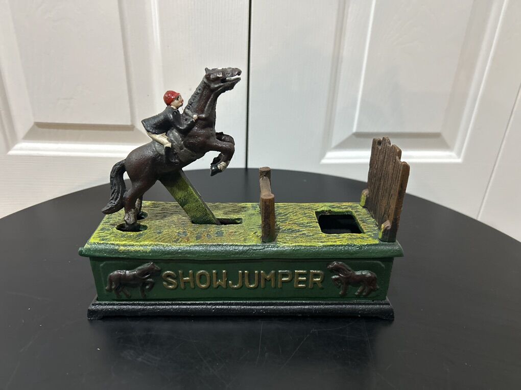 Vintage Cast Iron Show Jumper Coin Bank