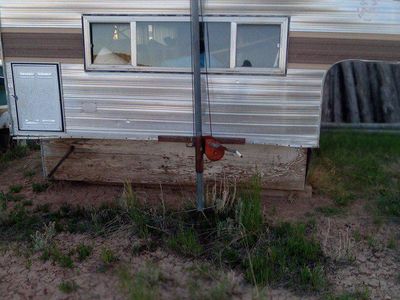 Eight foot cabover camper.