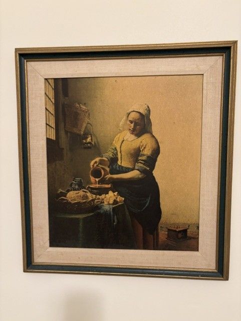 Framed reproduction of Vermeer's "The Milkmaid"