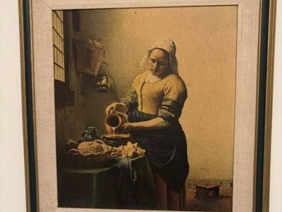 Framed reproduction of Vermeer's "The Milkmaid"