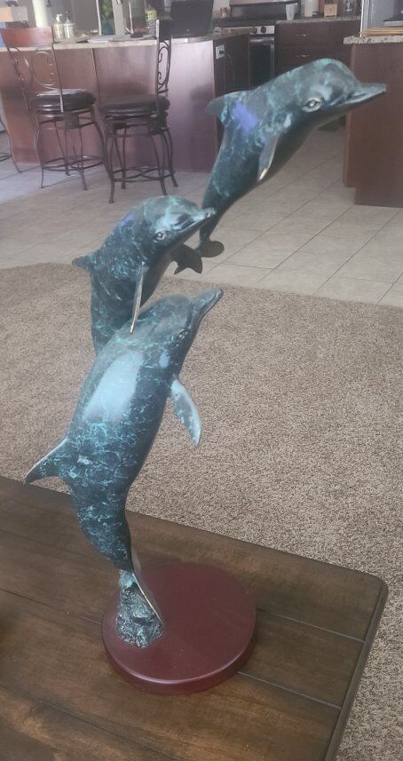 Bronze three dolphin pod statue
