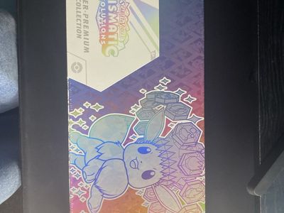Pokemon Scarlet & Violet Prismatic Evolutions Super Premium Collection - New, Sealed tear on top watch video