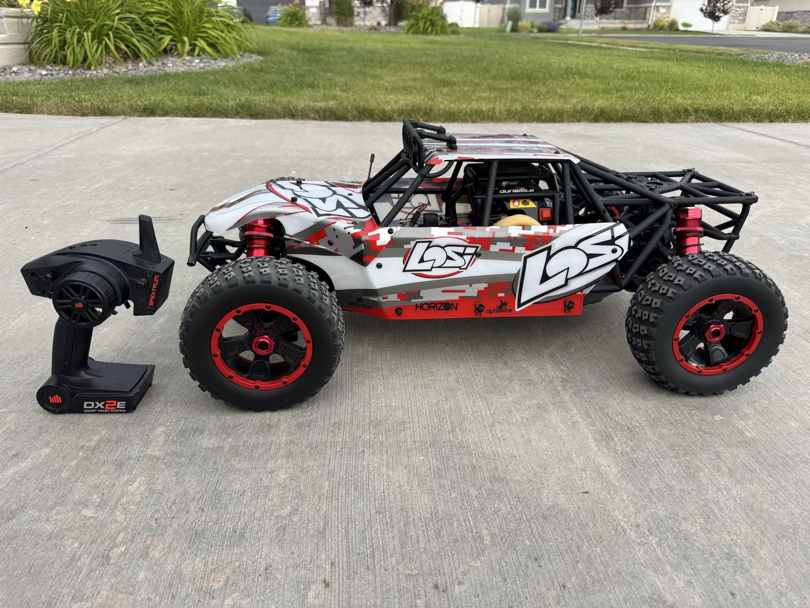 Losi Buggy 4WD, 23cc 2-stroke engine, almost new, everything works perfectly, $1,000