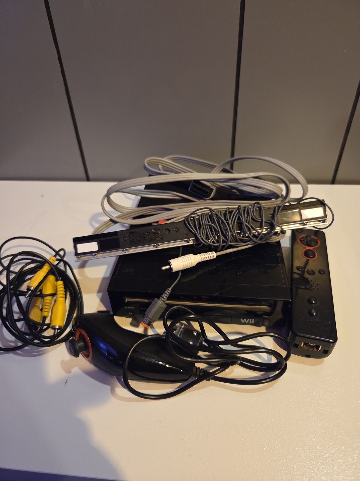 Wii console with controller and nunchuck