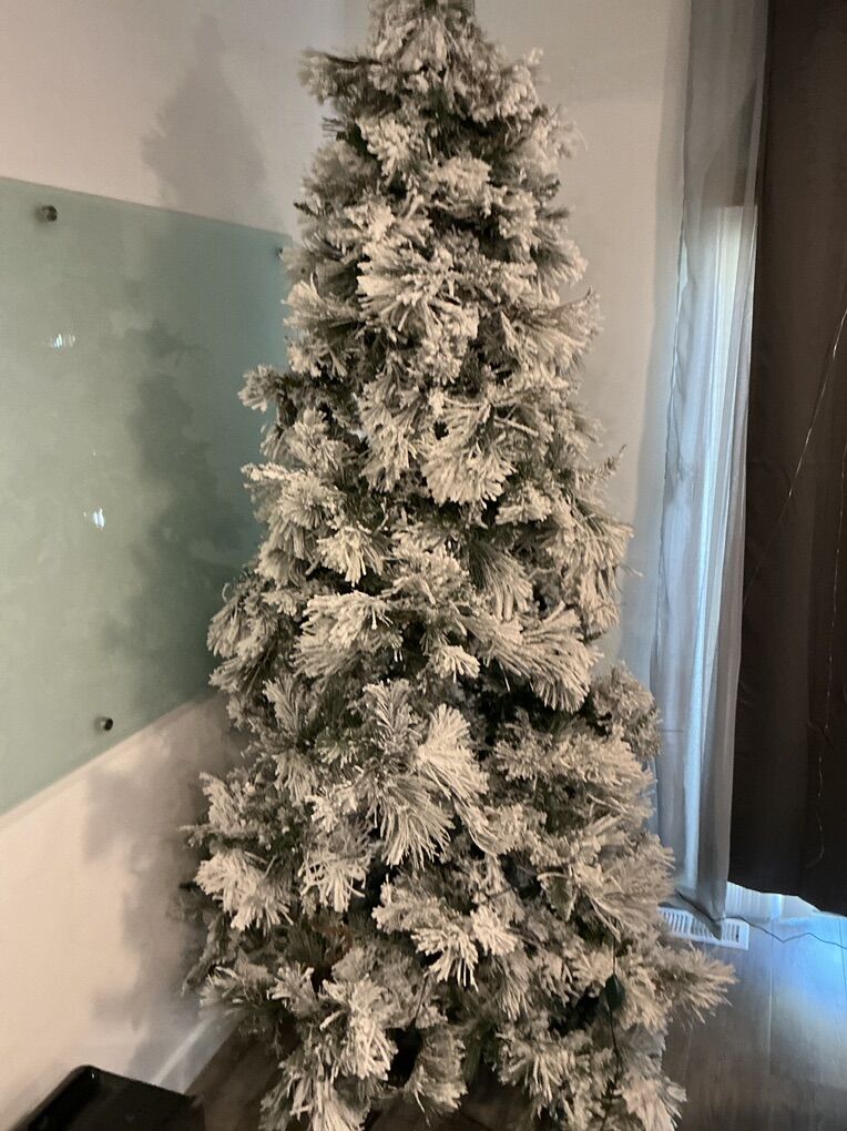 Free 9-foot Flocked LED Christmas Tree