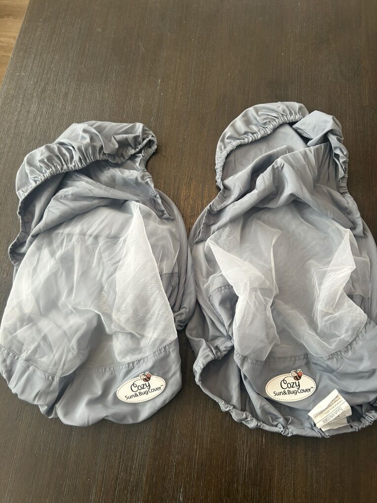 2 cozy sun &bug car seat covers.