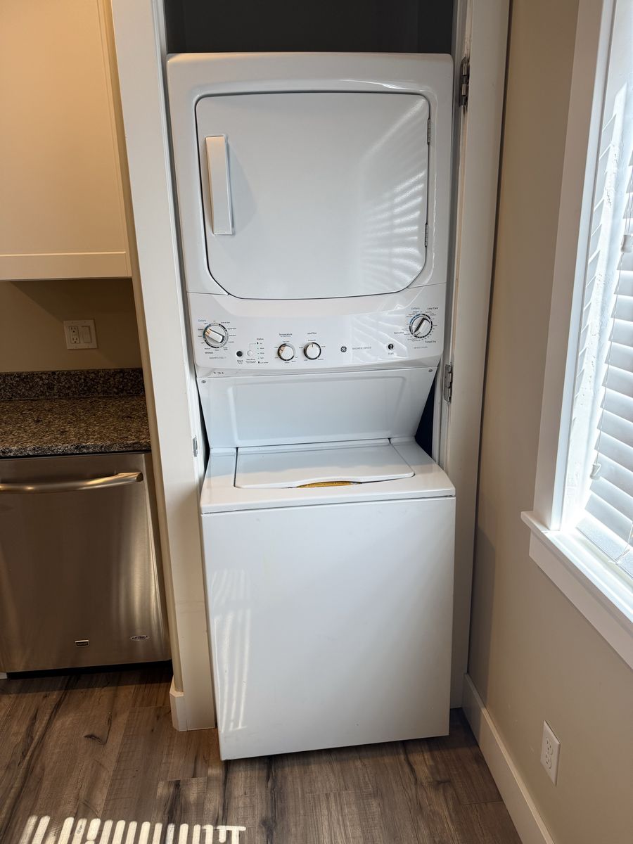 GE White Stackable Washer Dryer Combo Unit - nearly new - excellent condition