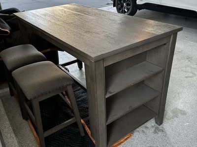 Caitbrook Counter Height Dining Table with shelves