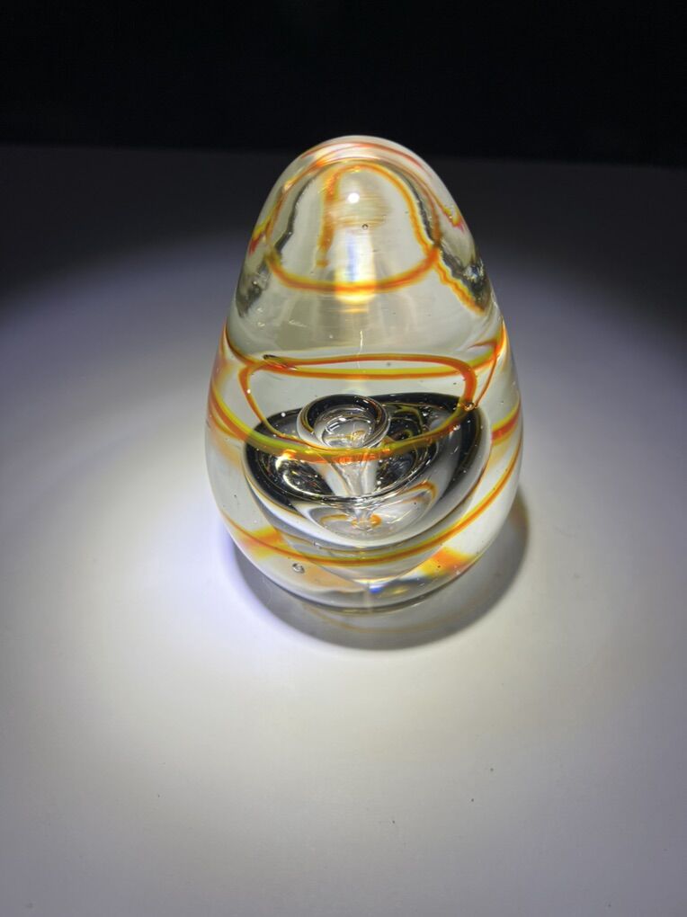 Hand blown art glass paperweights.