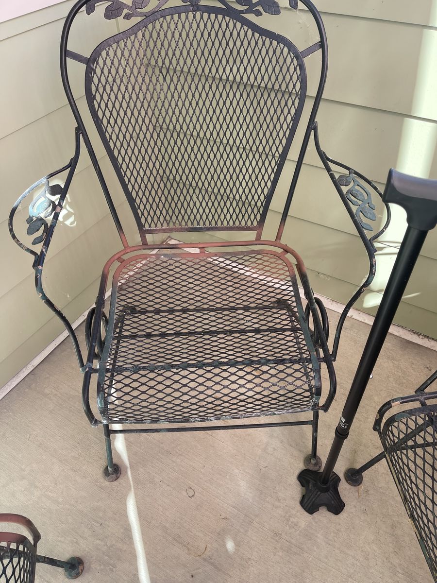 Metal patio table and four chairs
