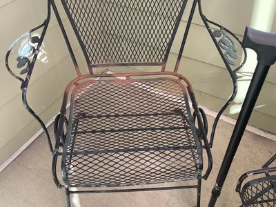 Metal patio table and four chairs