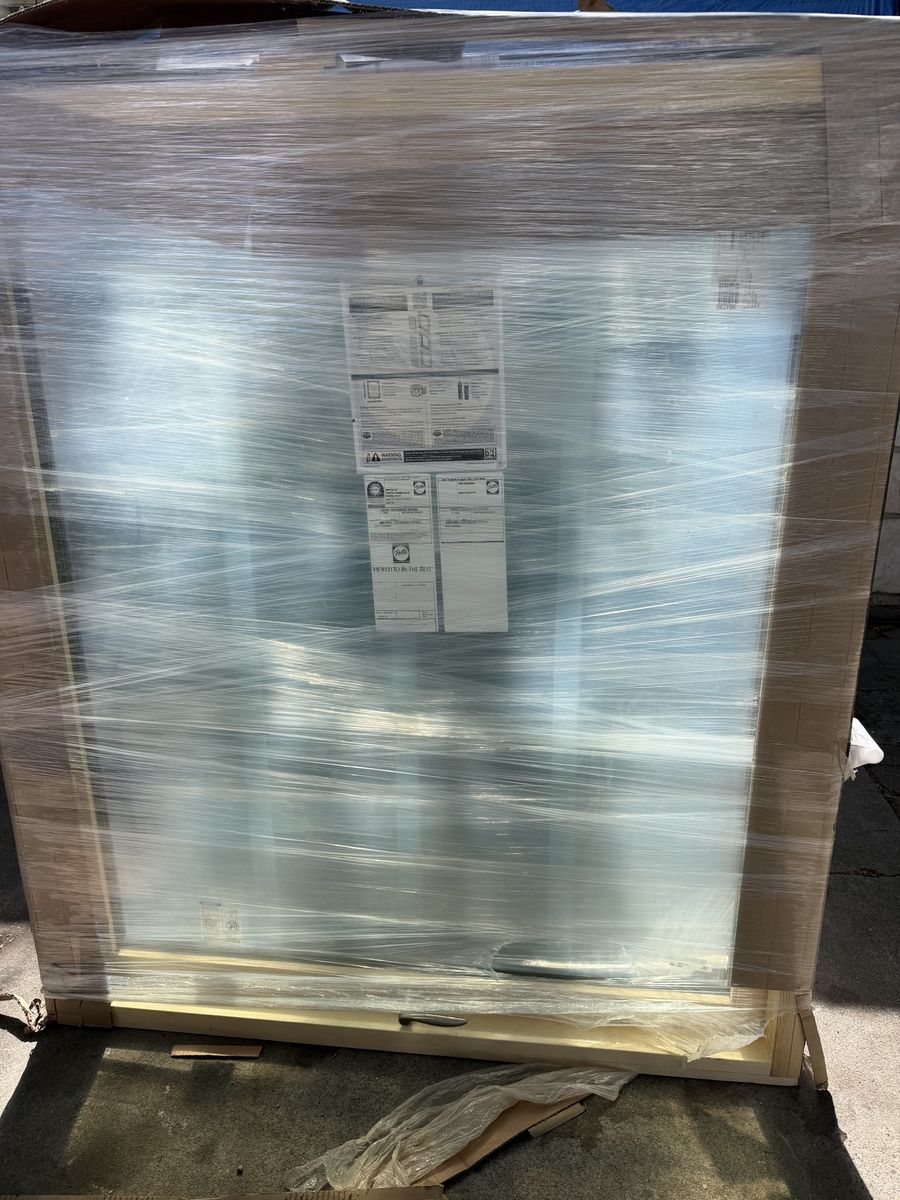 Pella brown left swing window