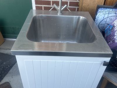 Stainless Steel Utility Sink with Faucet on White Cabinet - Great for Garage, Laundry, or Outdoor Use