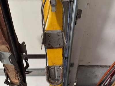 “vintage wooden skis with bear-trap bindings – cabin decor”