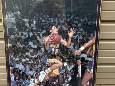 Vintage signed/ framed John Stockton poster.