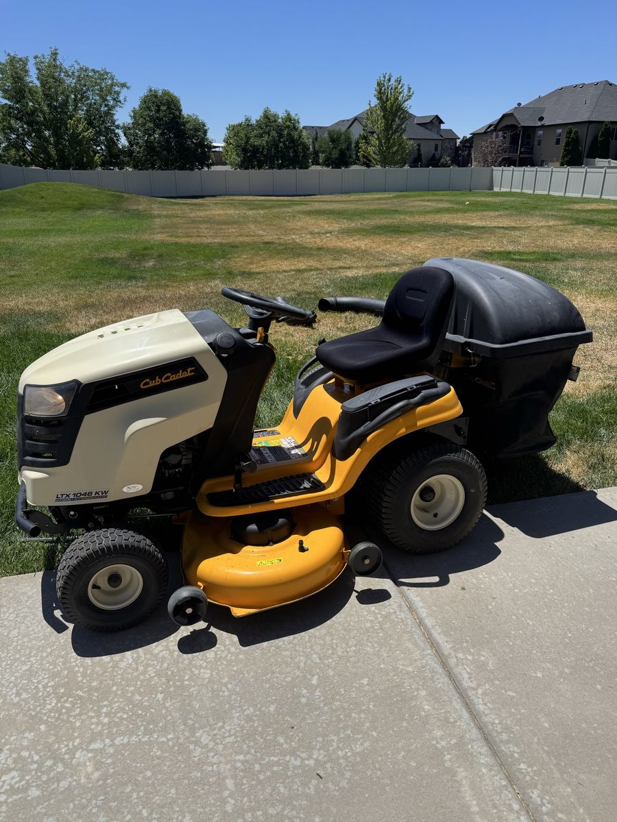 Cub Cadet LTX 1046 KW Riding Lawn Mower Tractor with Bagger Attachment